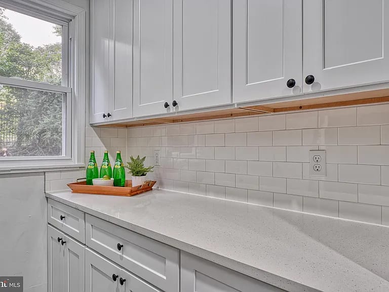 Cabinetry and subway tile detail from a kitchen renovation